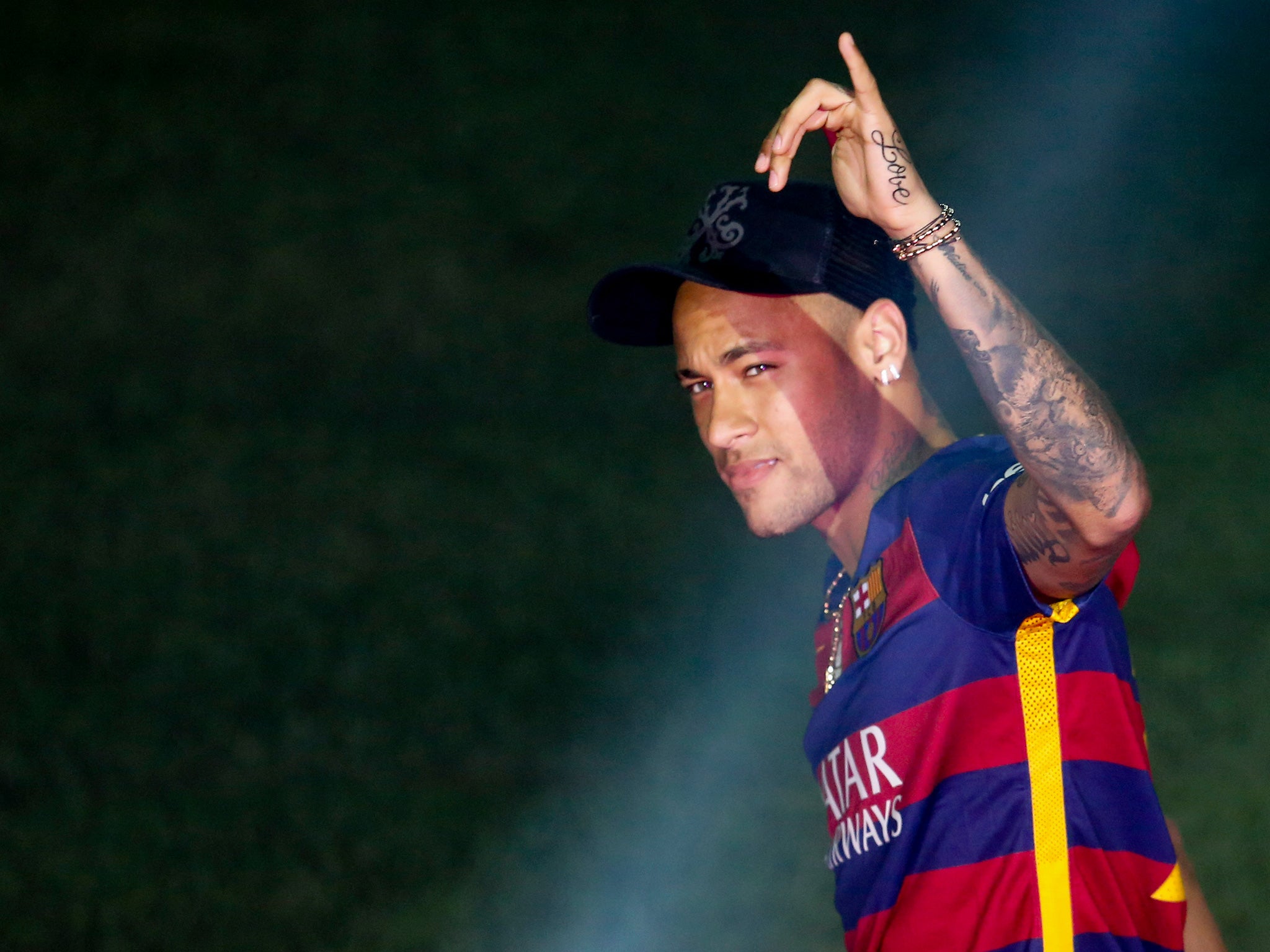 Neymar celebrating Barcelona's La Liga triumph at the Nou Camp