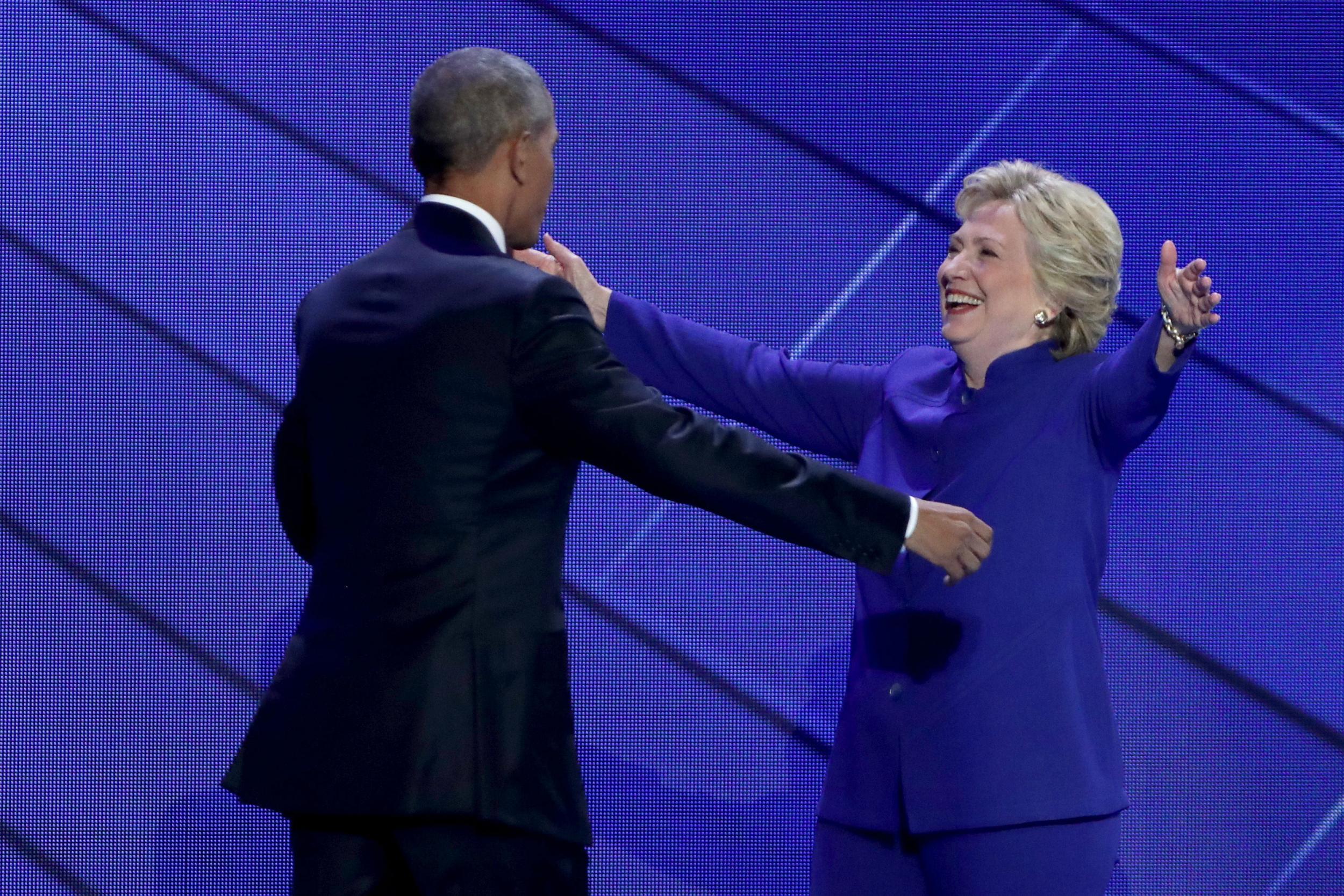 &#13;
Clinton joins Obama at the end of his speech &#13;