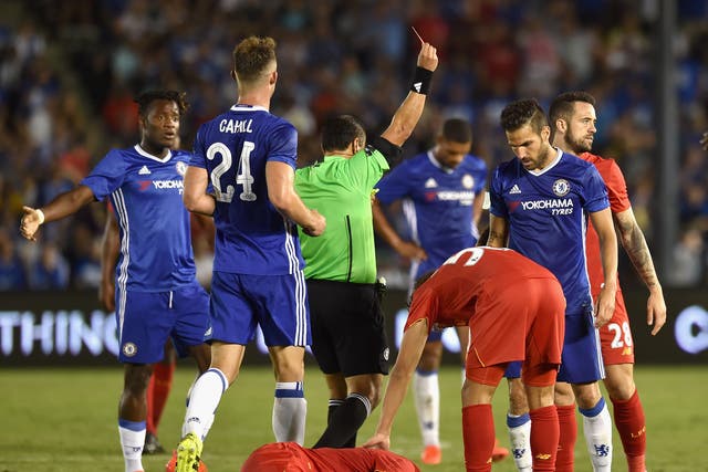 Cesc Fabregas is shown a red card during Chelsea's pre-season victory over Liverpool in Los Angeles