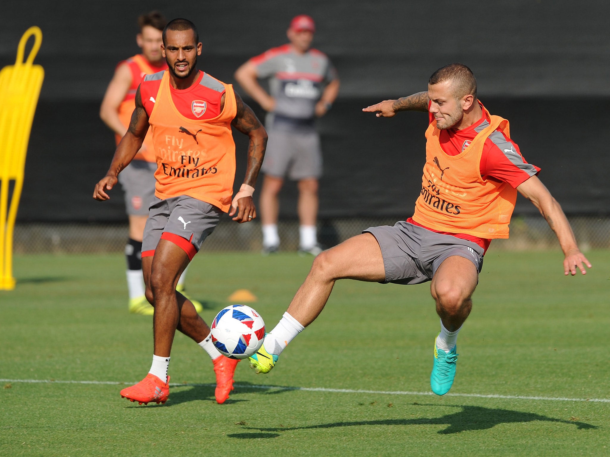 Jack Wilshere trains alongside Theo Walcott during Arsenal's tour of the United States