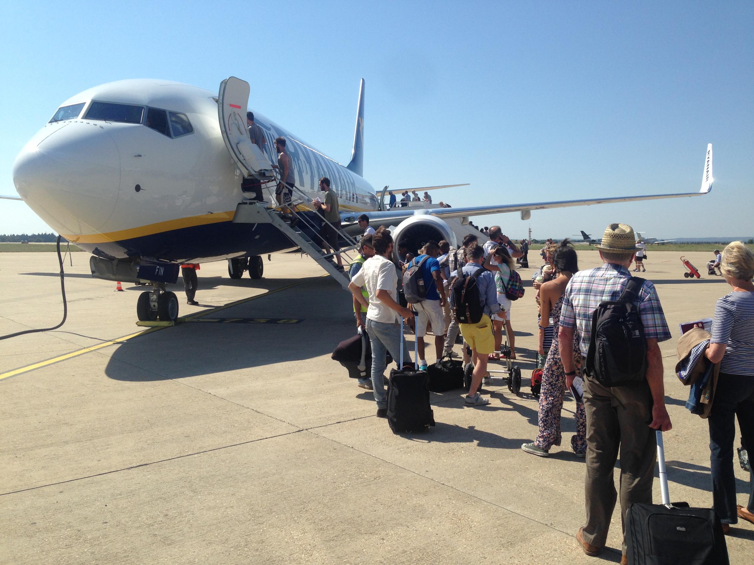 Ryanair says parents without pre-booked seats have caused problems on board
