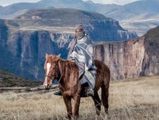 Riding high with the masked horsemen of Lesotho