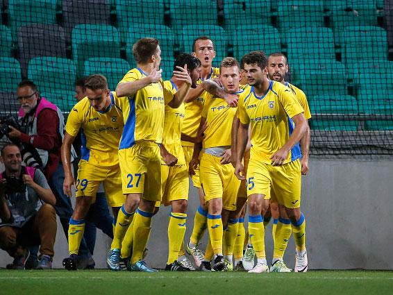 Matic Crnic is congratulated after scoring Domzale's opener from the penalty spot (Getty)