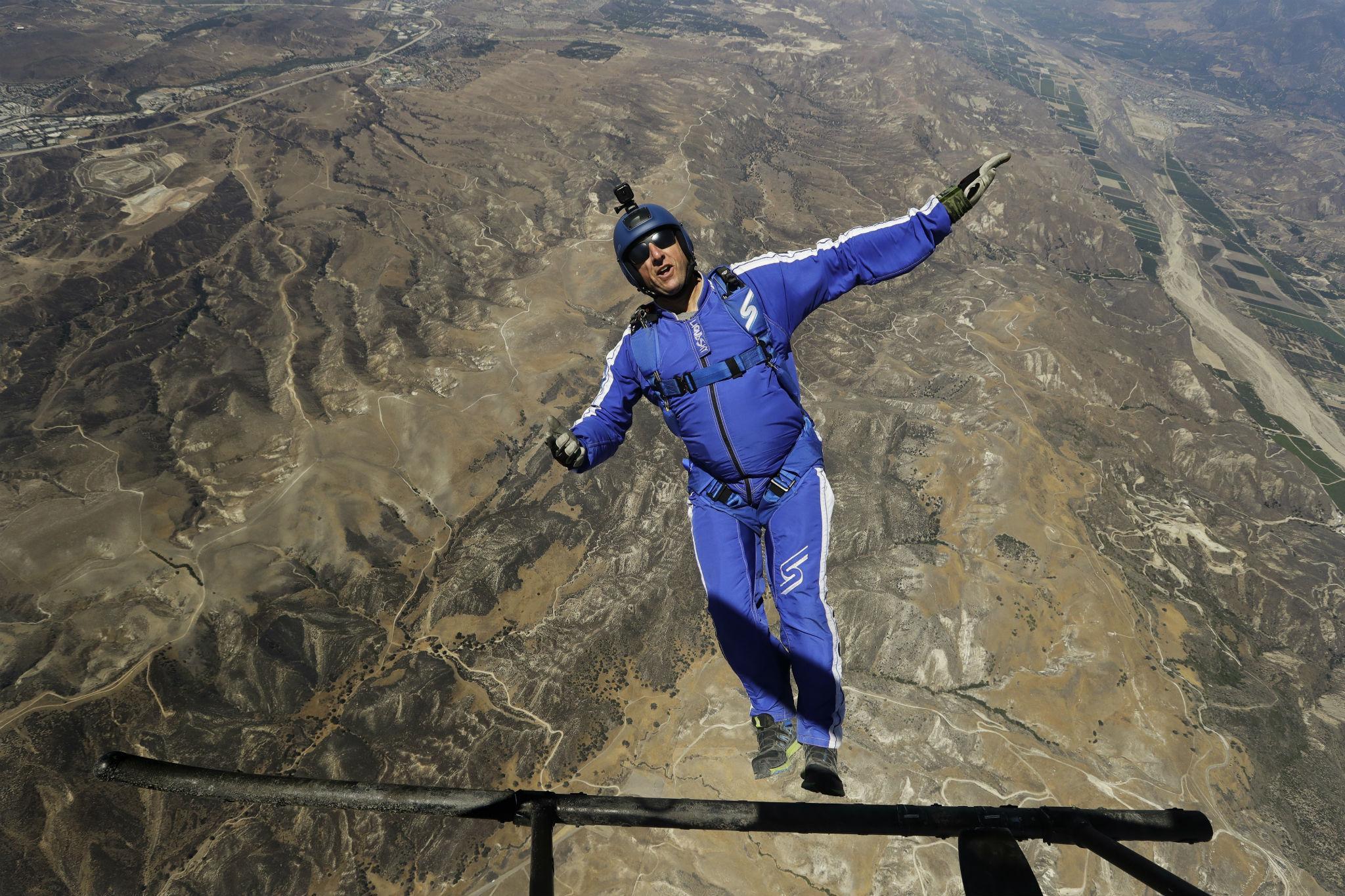 baby jumping out of a plane with a parachute - n 6