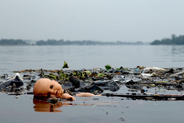 Pollution floating in Guanabara Bay <em>Matthew Stockman/Getty</em>