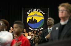 Flint water crisis: Six Michigan state employees charged in connection to scandal