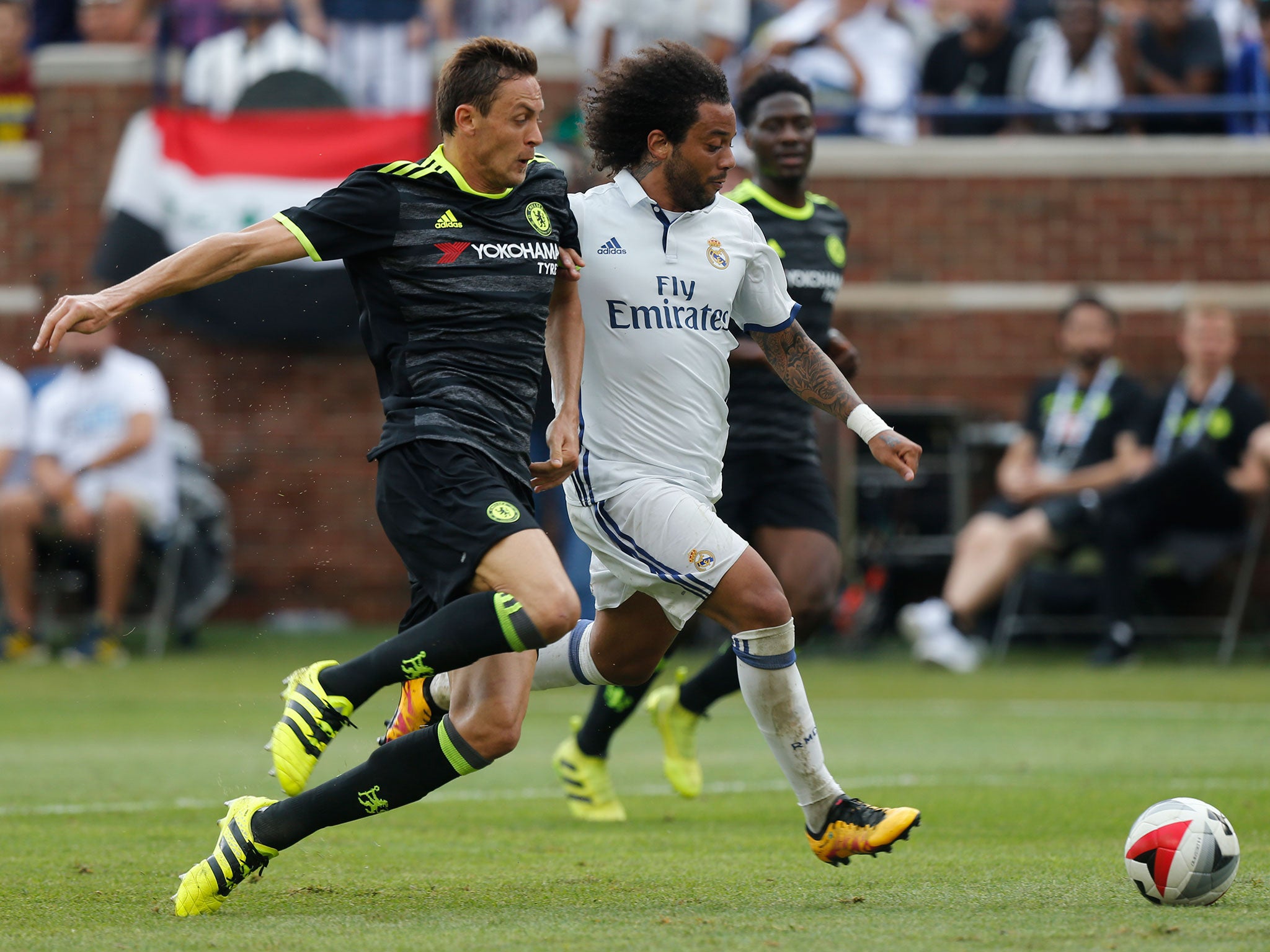 Nemanja Matic and Marcelo compete for the ball