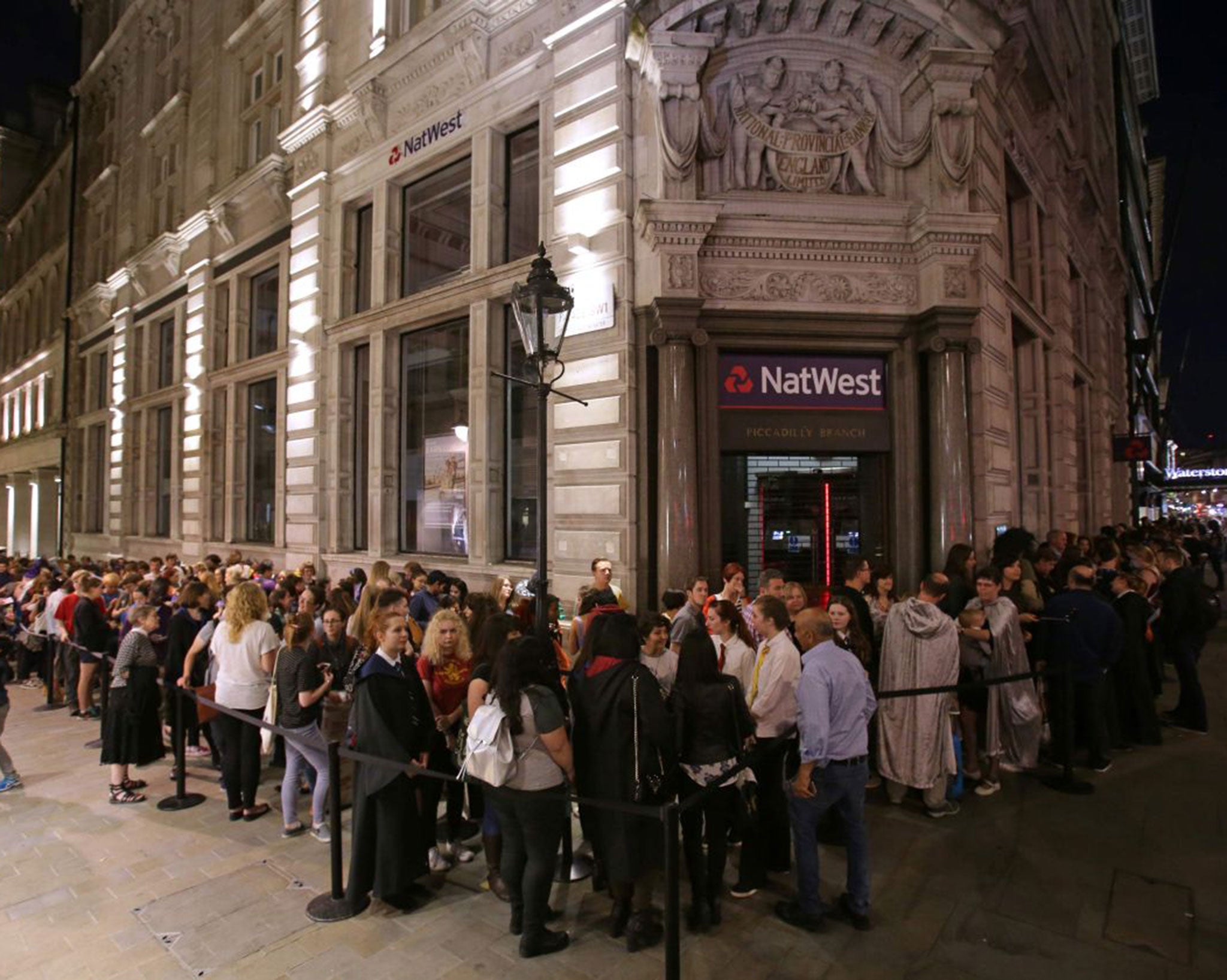 Fans queue in London ahead of the midnight release of the playscripts