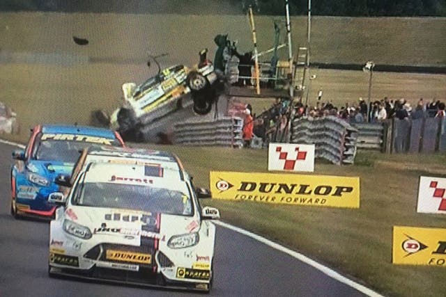 Hunter Abbott's Chevrolet Cruse flips into a TV tower during the BTCC race three at Snetterton