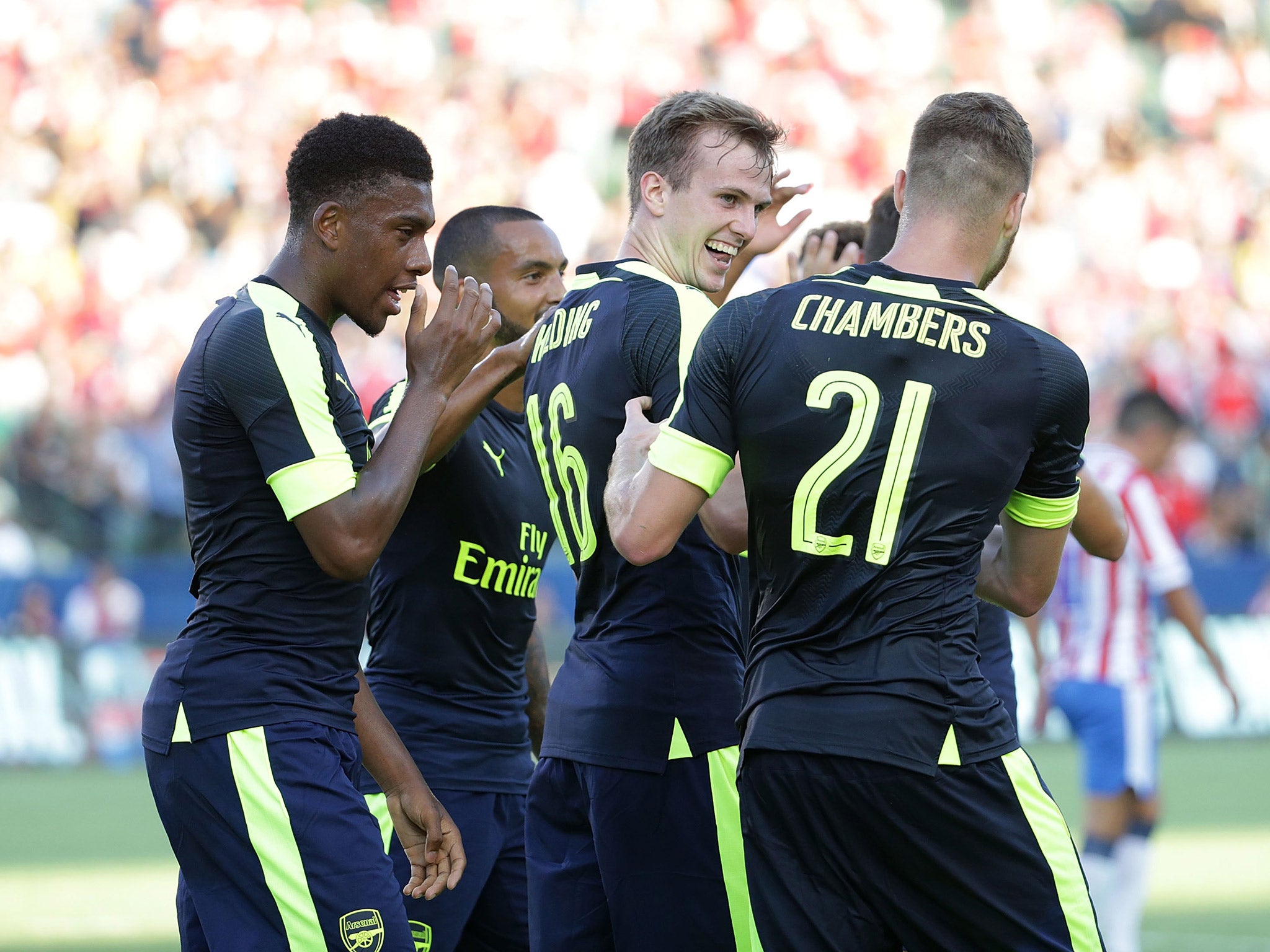 Rob Holding celebrates with Calum Chambers after opening the scoring