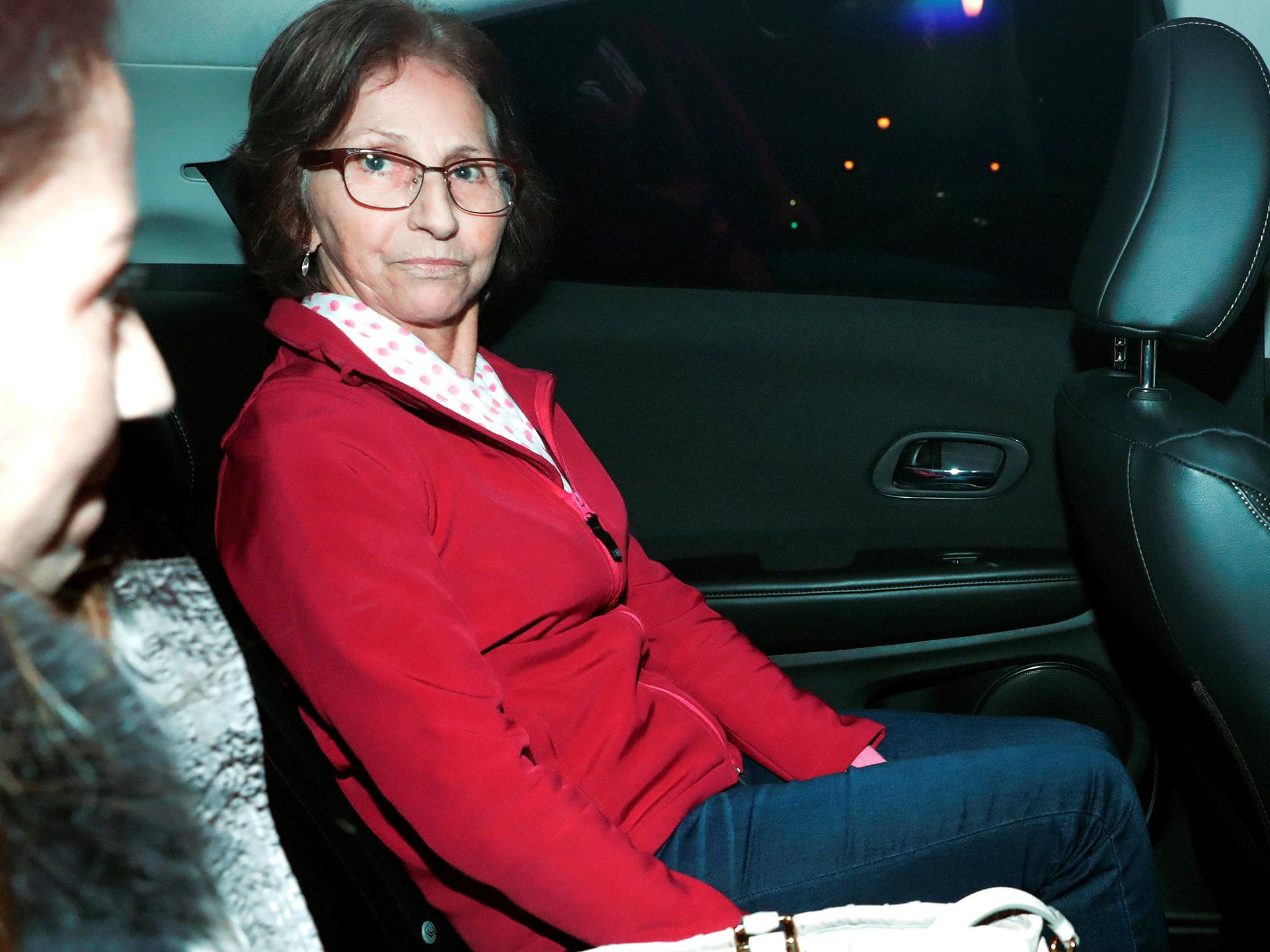Aparecida Schunck, mother-in-law of Formula One supremo Bernie Ecclestone, leaves a police station in Sao Paulo, Brazil