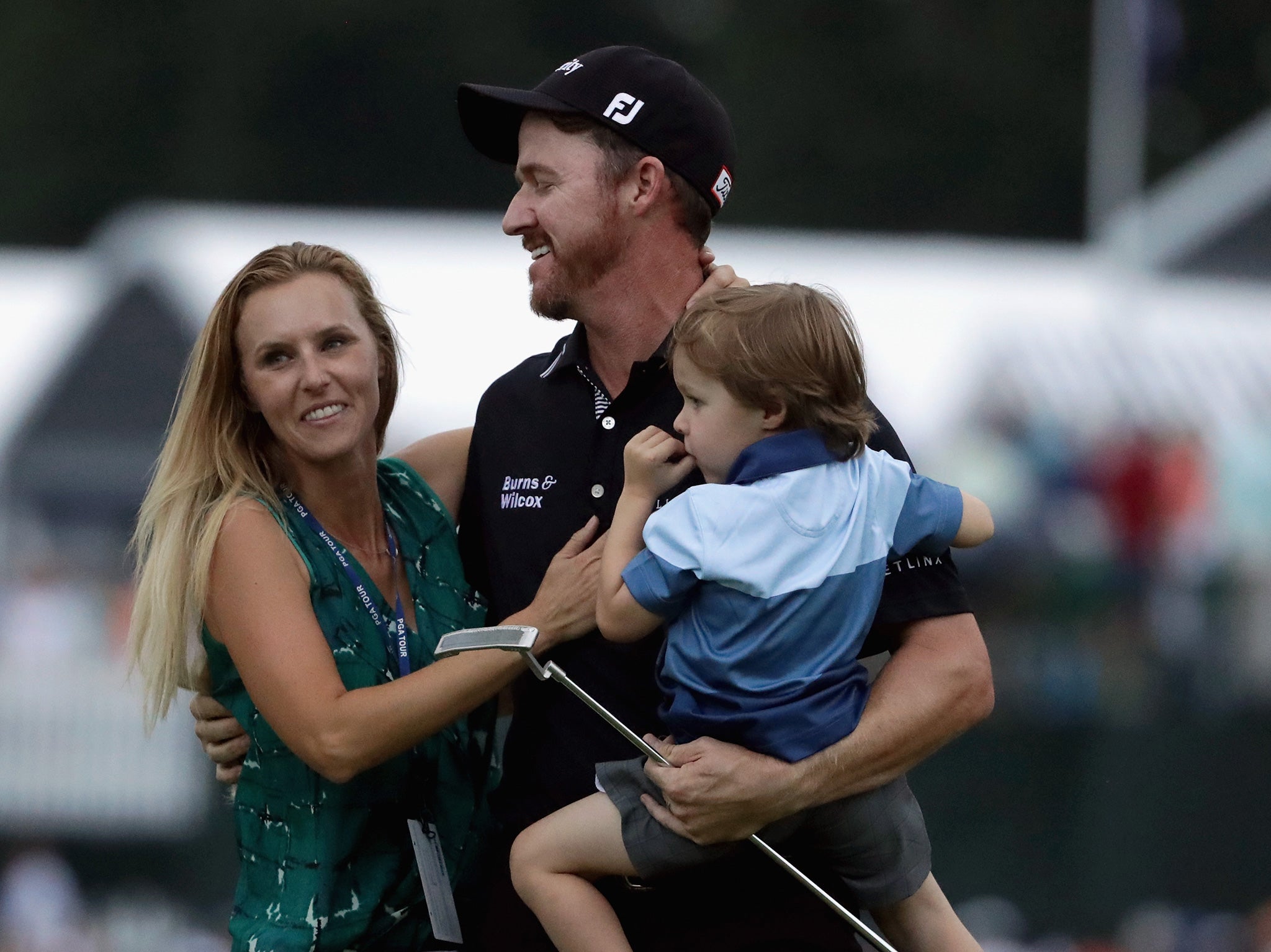 Walker celebrates with his wife Erin and son Beckett