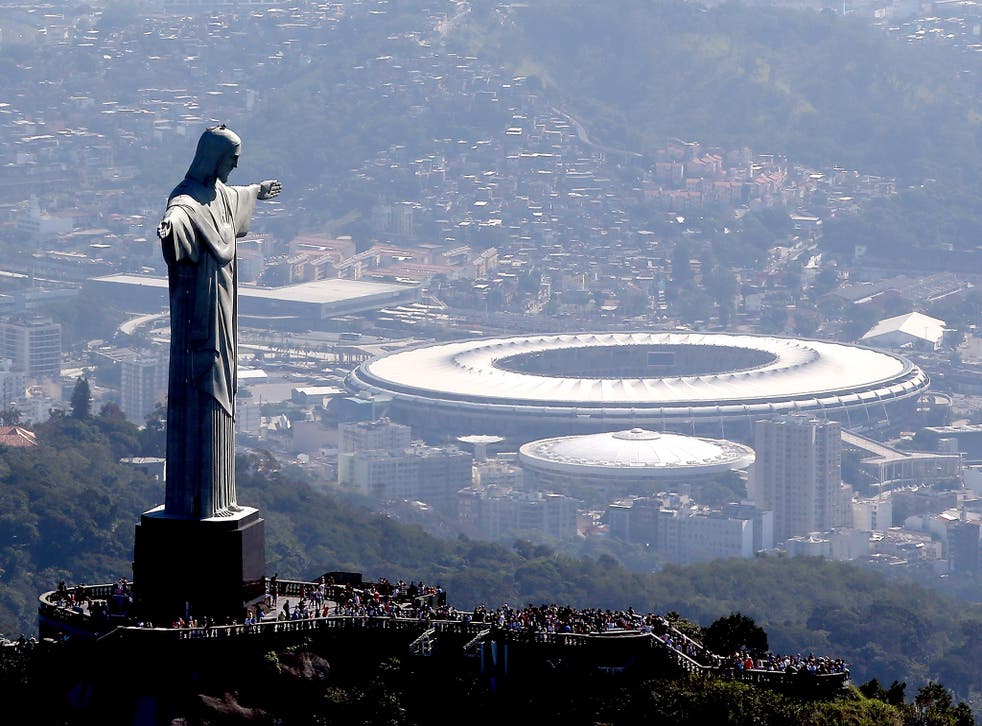 Christ the Redeemer stands over the Maracana Stadium