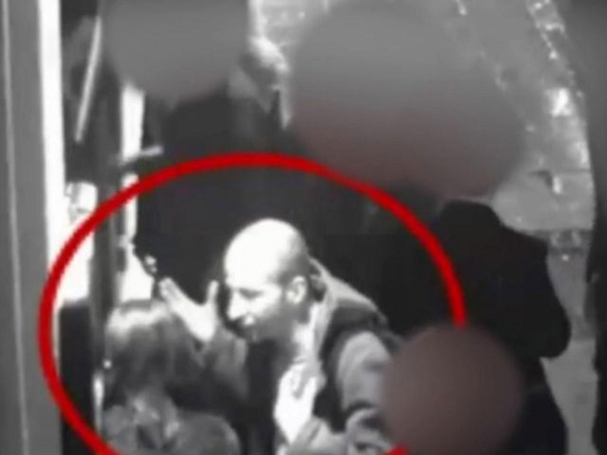 Undated handout still from CCTV footage issued by Northamptonshire Police of Edward Tenniswood talking to India Chipchase outside NB's nightclub in Northampton