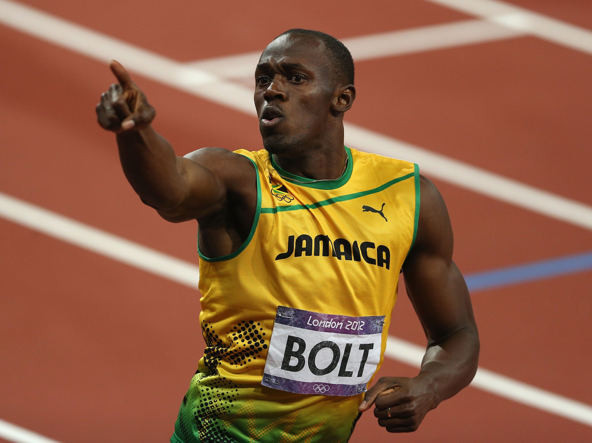 Bolt celebrates winning the 200m gold at London 2012