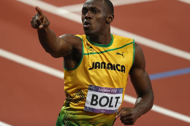 Bolt celebrates winning the 200m gold at London 2012