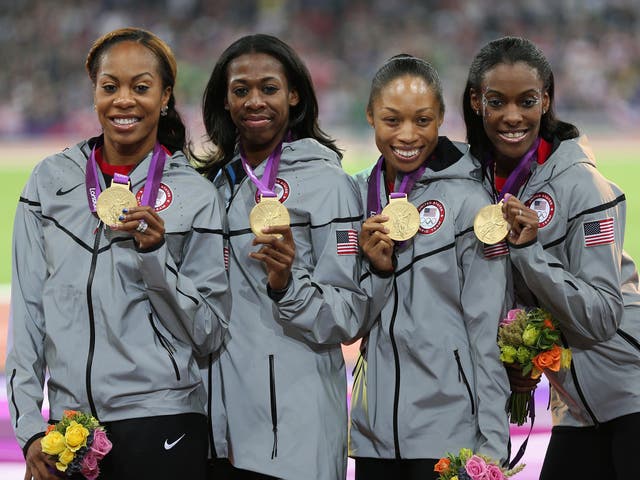 DeeDee Trotter, Allyson Felix, Francena McCorory and Sanya Richards-Ross of the United States celebrate their London 2012 triumph