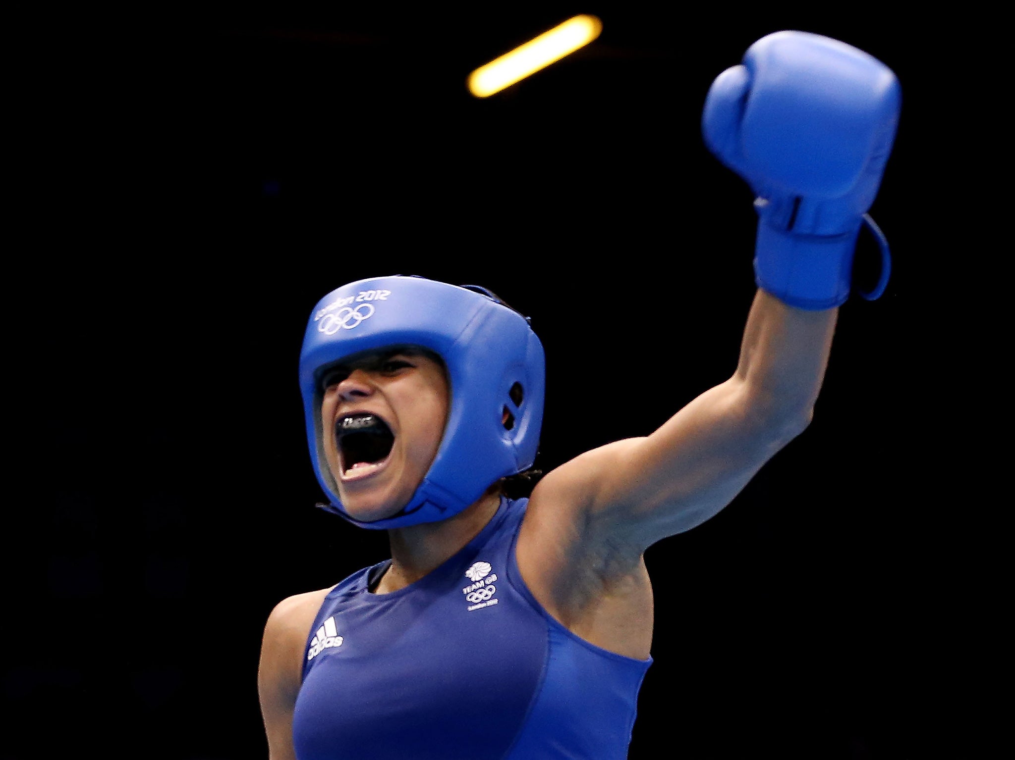 Jonas celebrates her victory over Quanitta Underwood in 2012