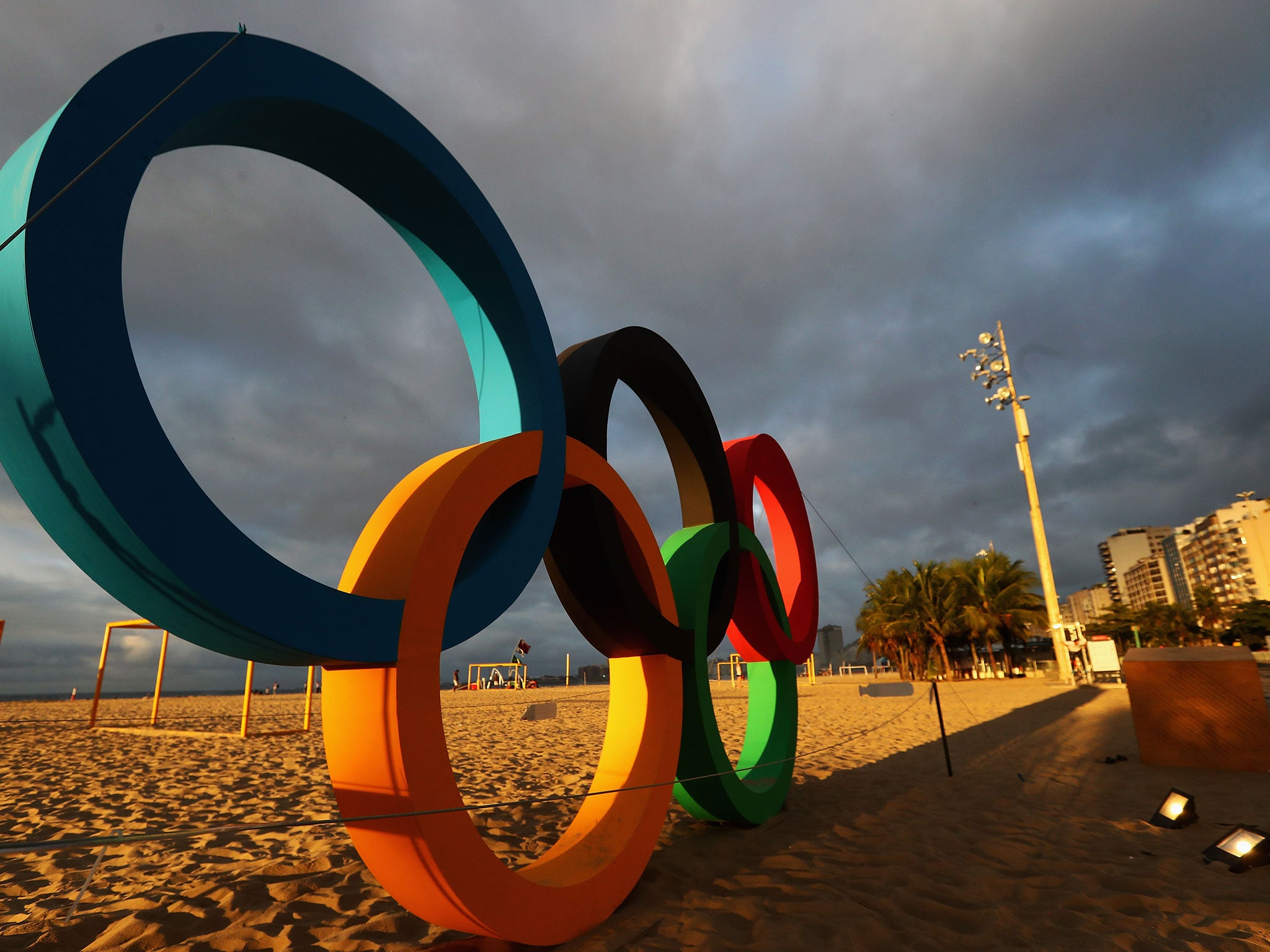 The official Olympic rings on the beach in Brazil - but copy them at your peril