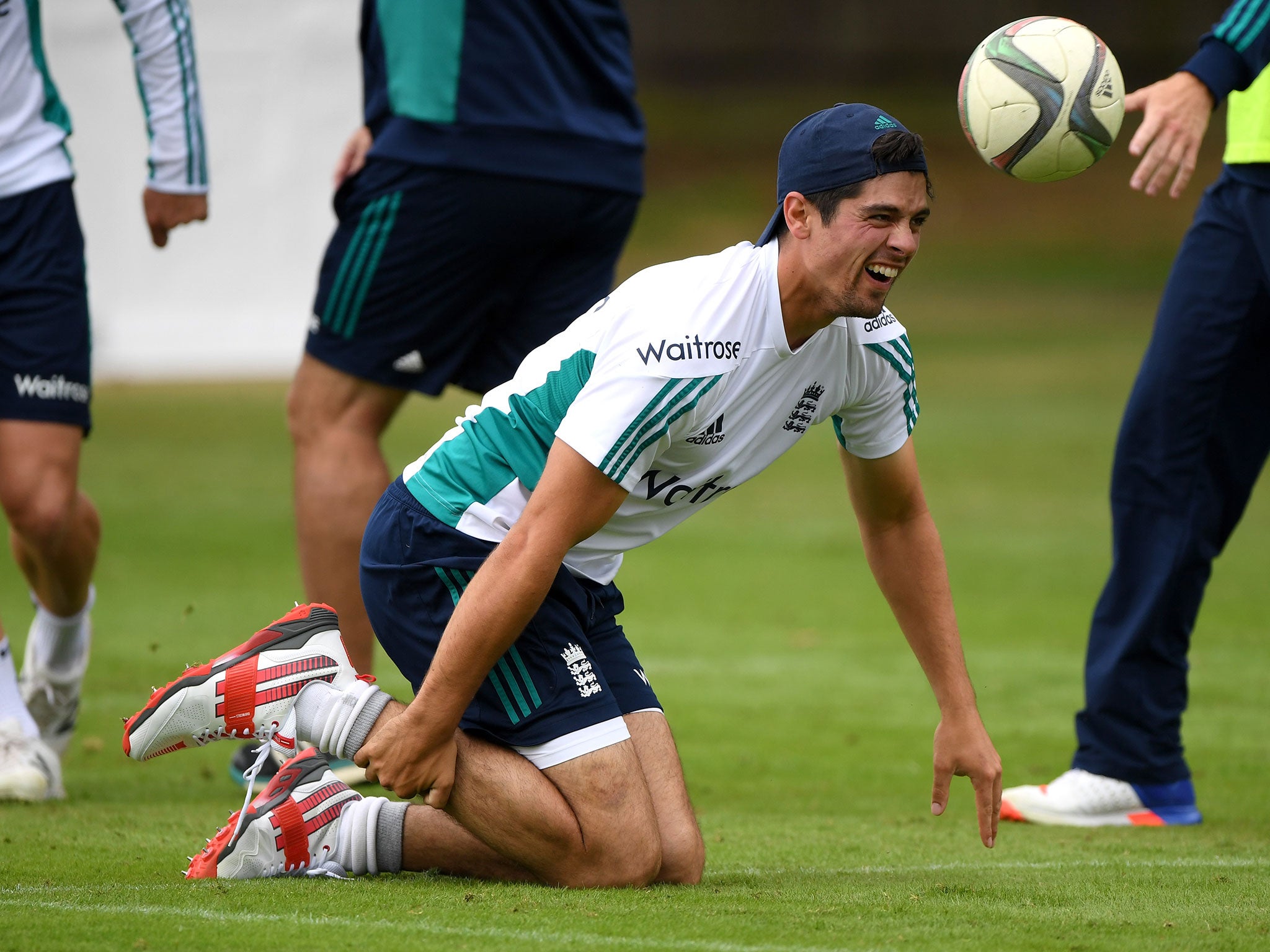 Alastair Cook takes a tumble during a football kickabout on Tuesday