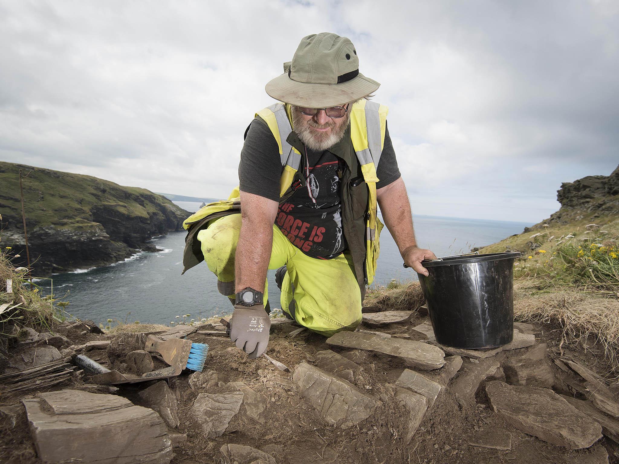 Ryan Smith of the Cornwall Archaeological Unit excavating at the Tintagel site in North Cornwall