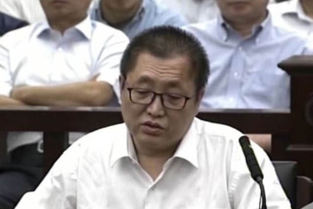 Zhai Yanmin speaks during his trial at the Tianjin No. 2 Intermediate People's Court in northern China's Tianjin Municipality