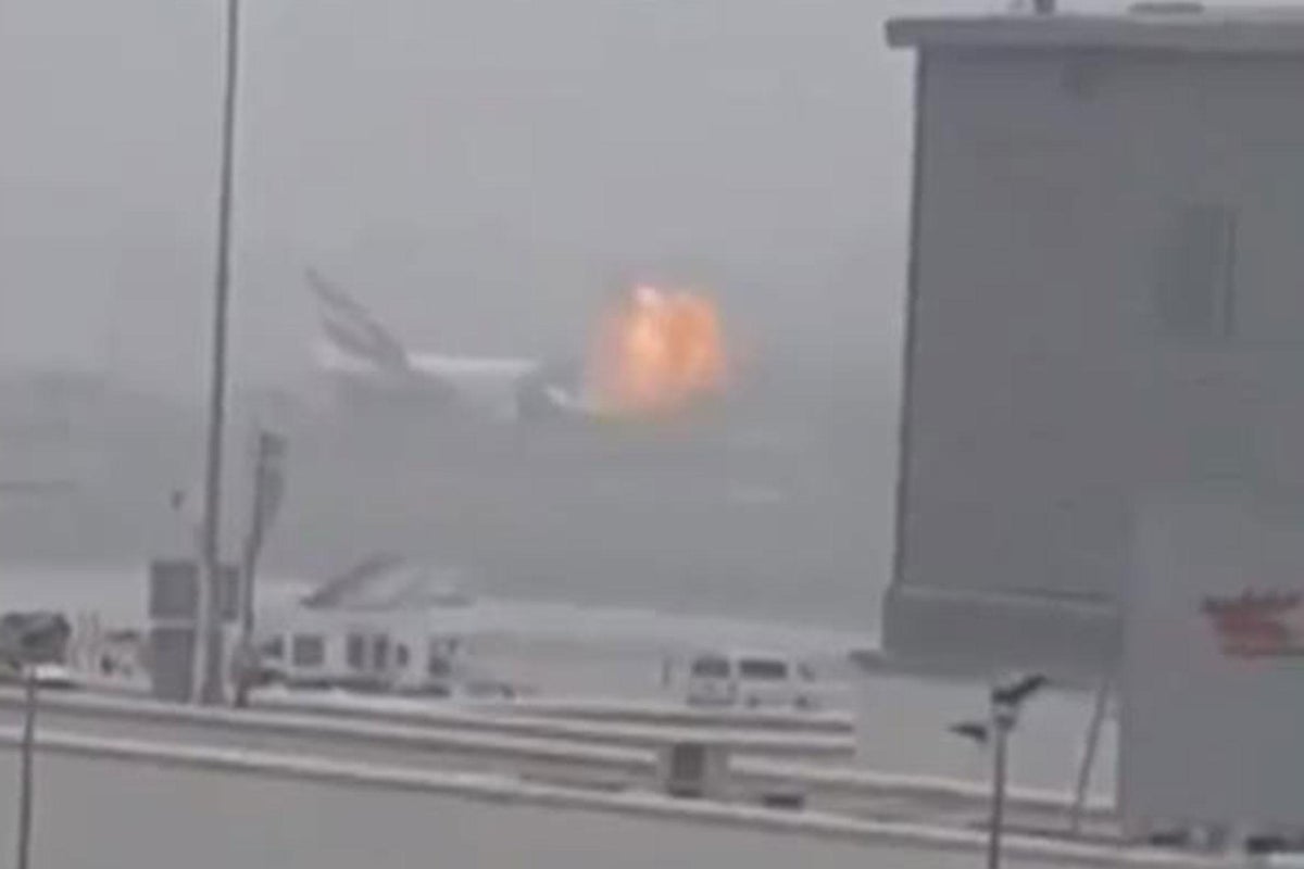 Dubai airport fire: Firefighter dies tackling Emirates plane runway blaze |  The Independent | The Independent