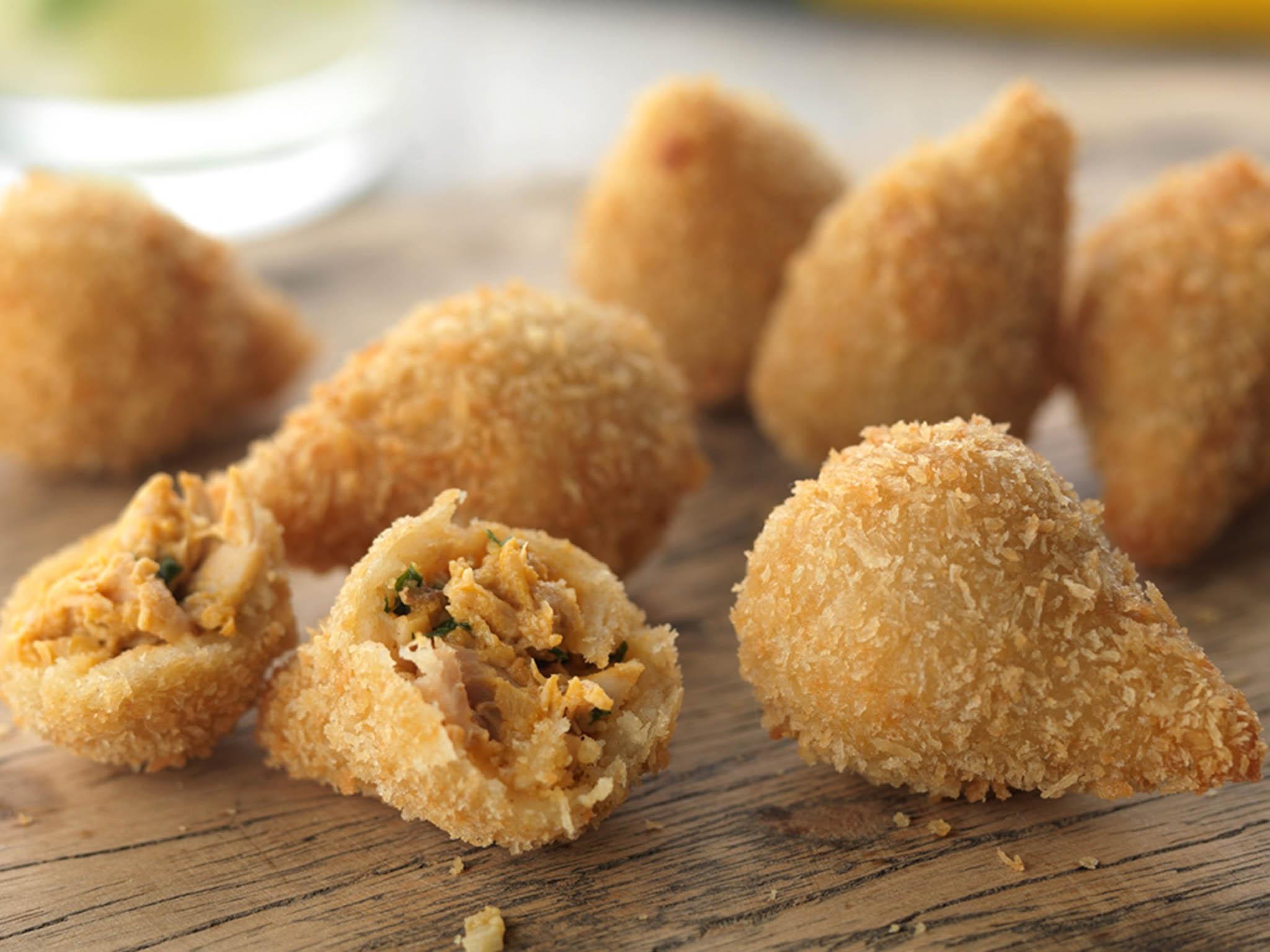 Brazilians love their deep fried food and chicken coxinha, filled with chicken and cheese, are no exception