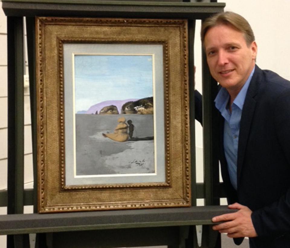 Arthur Brand with Salvador Dali’s ‘Adolescence’, which he recovered after months of negotiations with criminal gangs