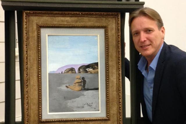 Arthur Brand with Salvador Dali’s ‘Adolescence’, which he recovered after months of negotiations with criminal gangs