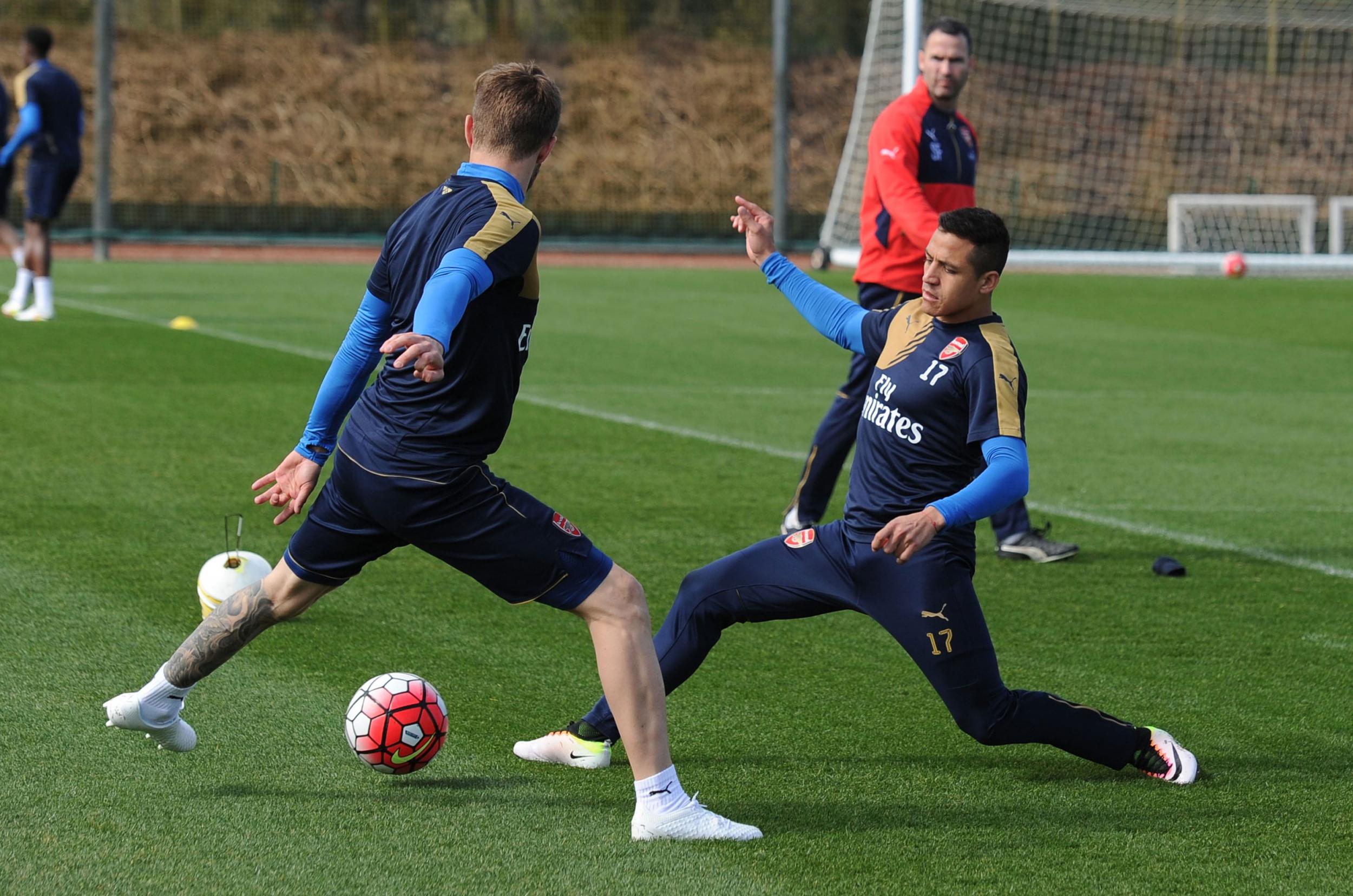 Sanchez and Ramsey in training at London Colney last season