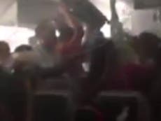 Dubai plane fire: Video shows chaos of Emirates emergency evacuation as passengers try to grab suitcases
