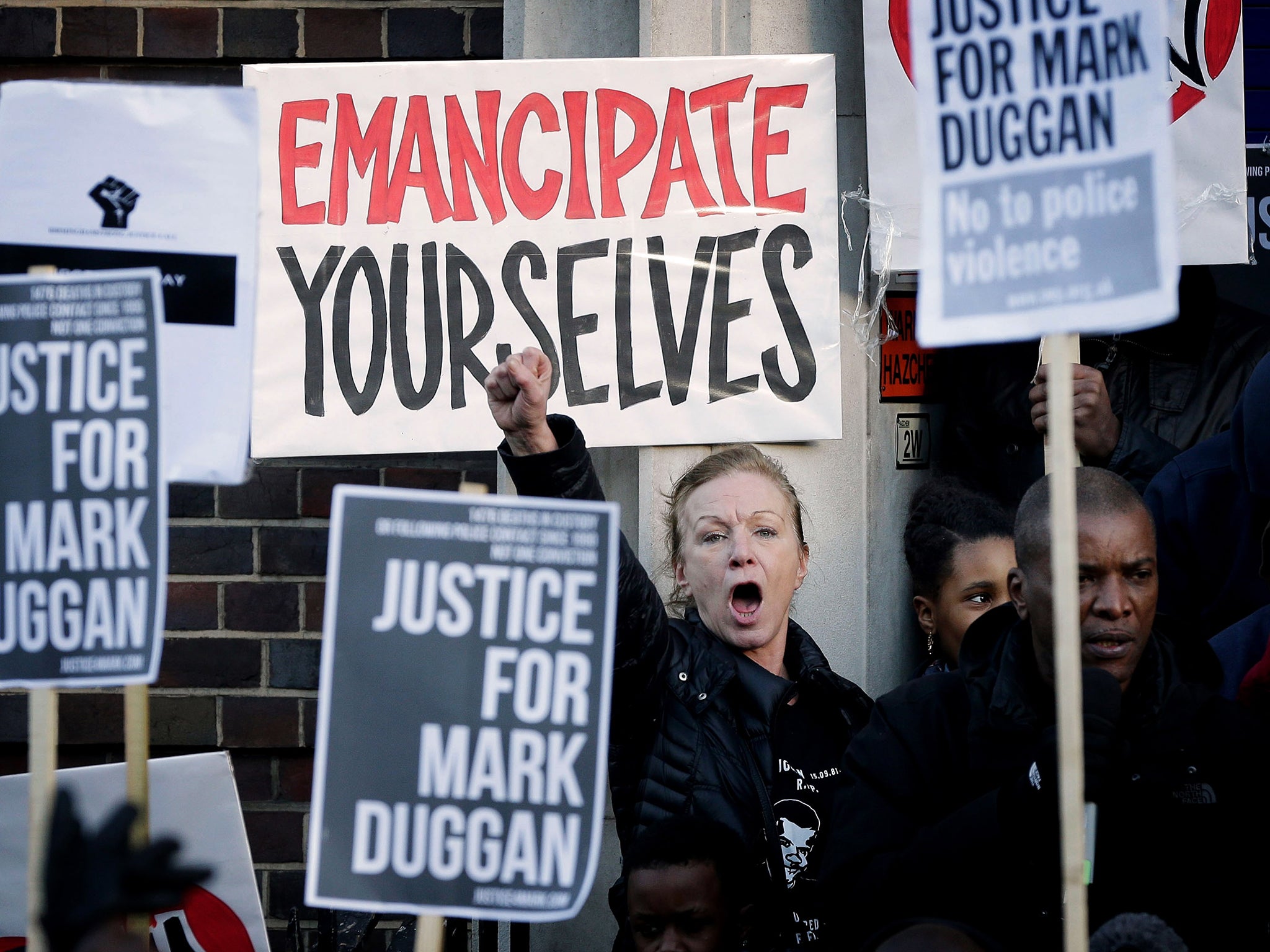 Mark Duggan’s aunt, Carole Duggan takes part in a vigil on the steps of Tottenham Police station in 2014