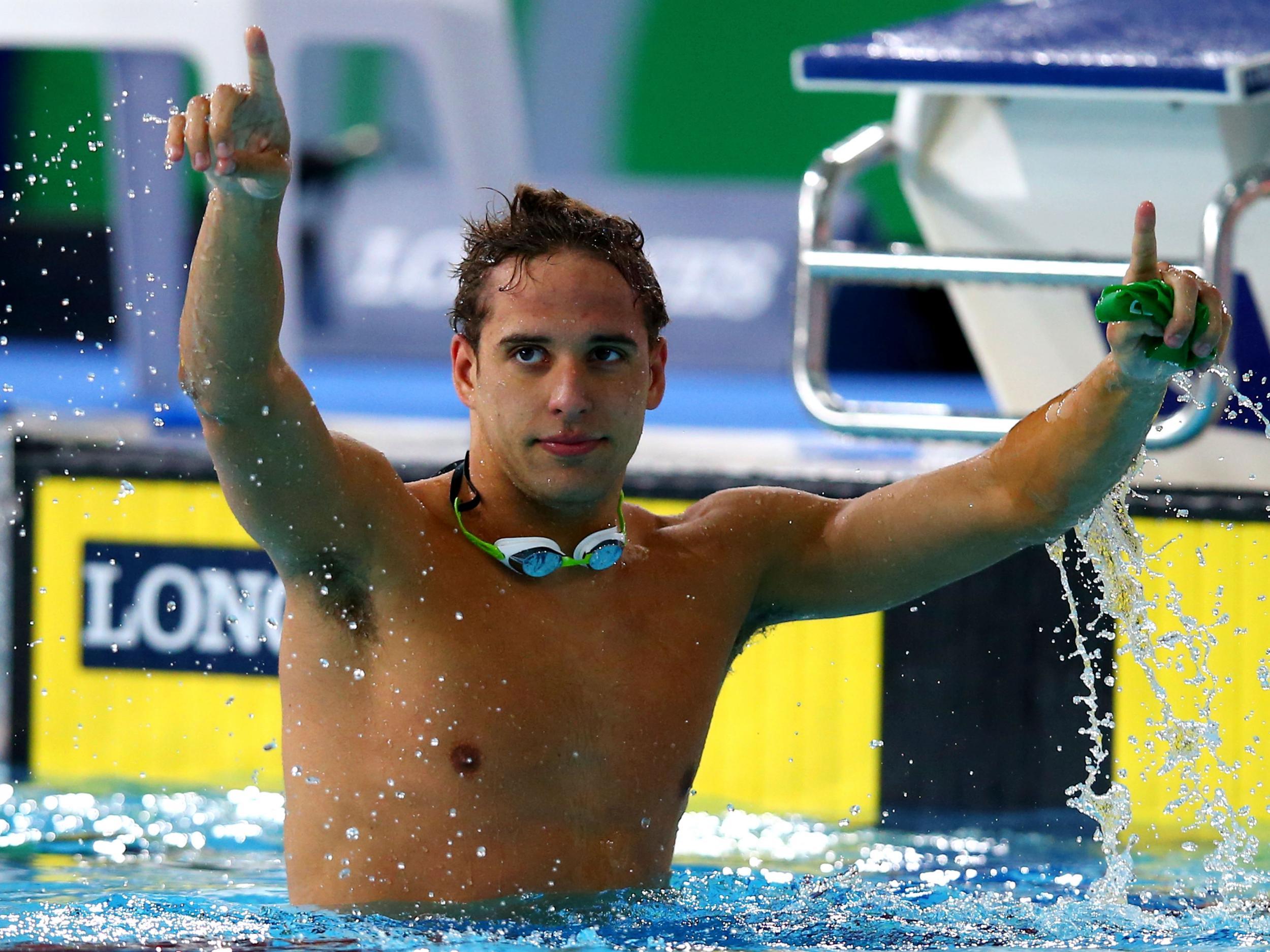 Chad le Clos of South Africa celebrates winning the gold medal in the Men's 100m Butterfly Final at Tollcross International Swimming Centre during day five of the Glasgow 2014 Commonwealth Games