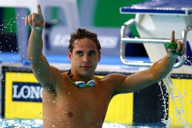 Chad le Clos of South Africa celebrates winning the gold medal in the Men's 100m Butterfly Final at Tollcross International Swimming Centre during day five of the Glasgow 2014 Commonwealth Games