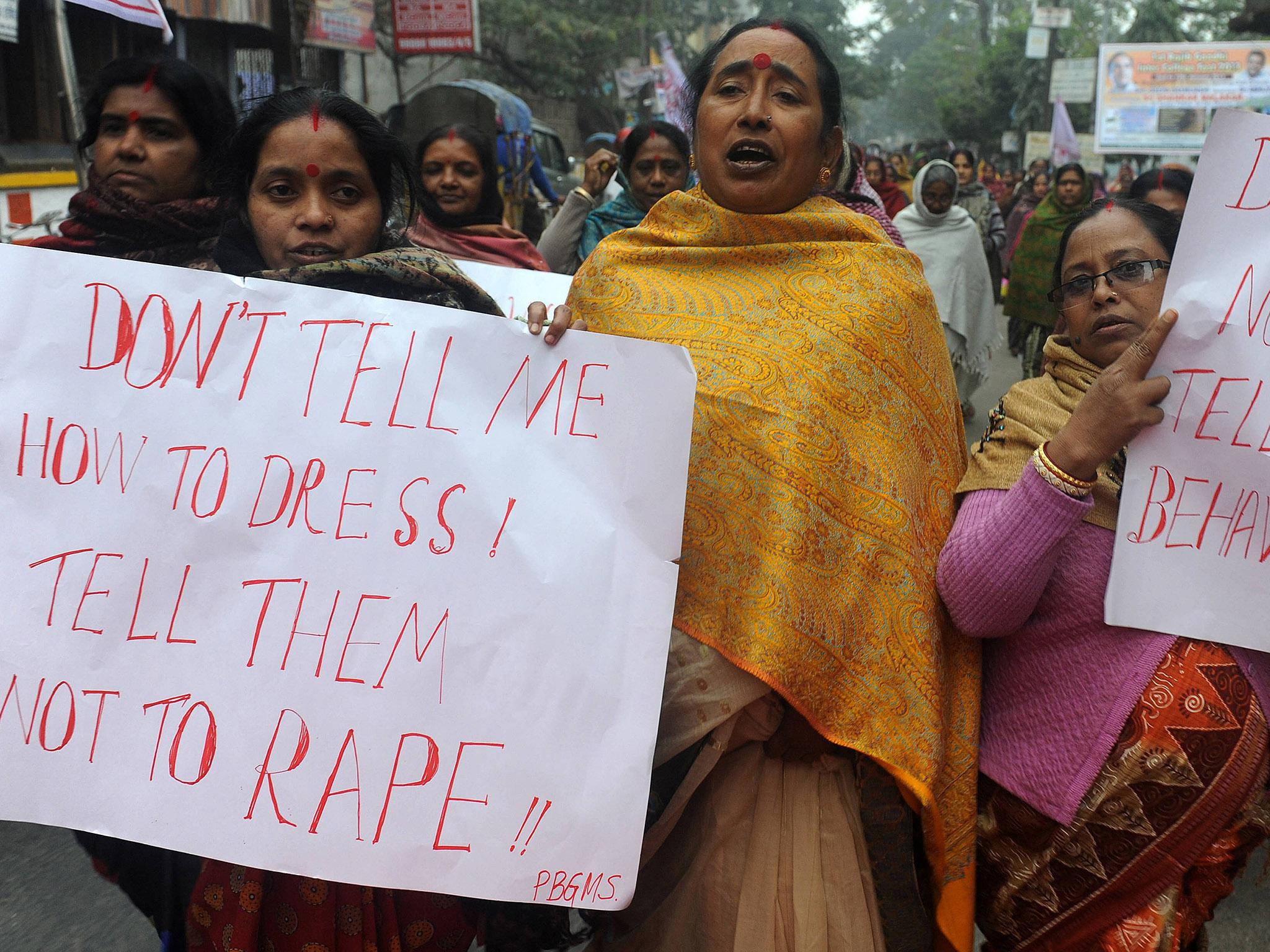 Representative image. Indian women activists hold placards during a protest against the gang rape and murder of a student in the Indian capital New Delhi