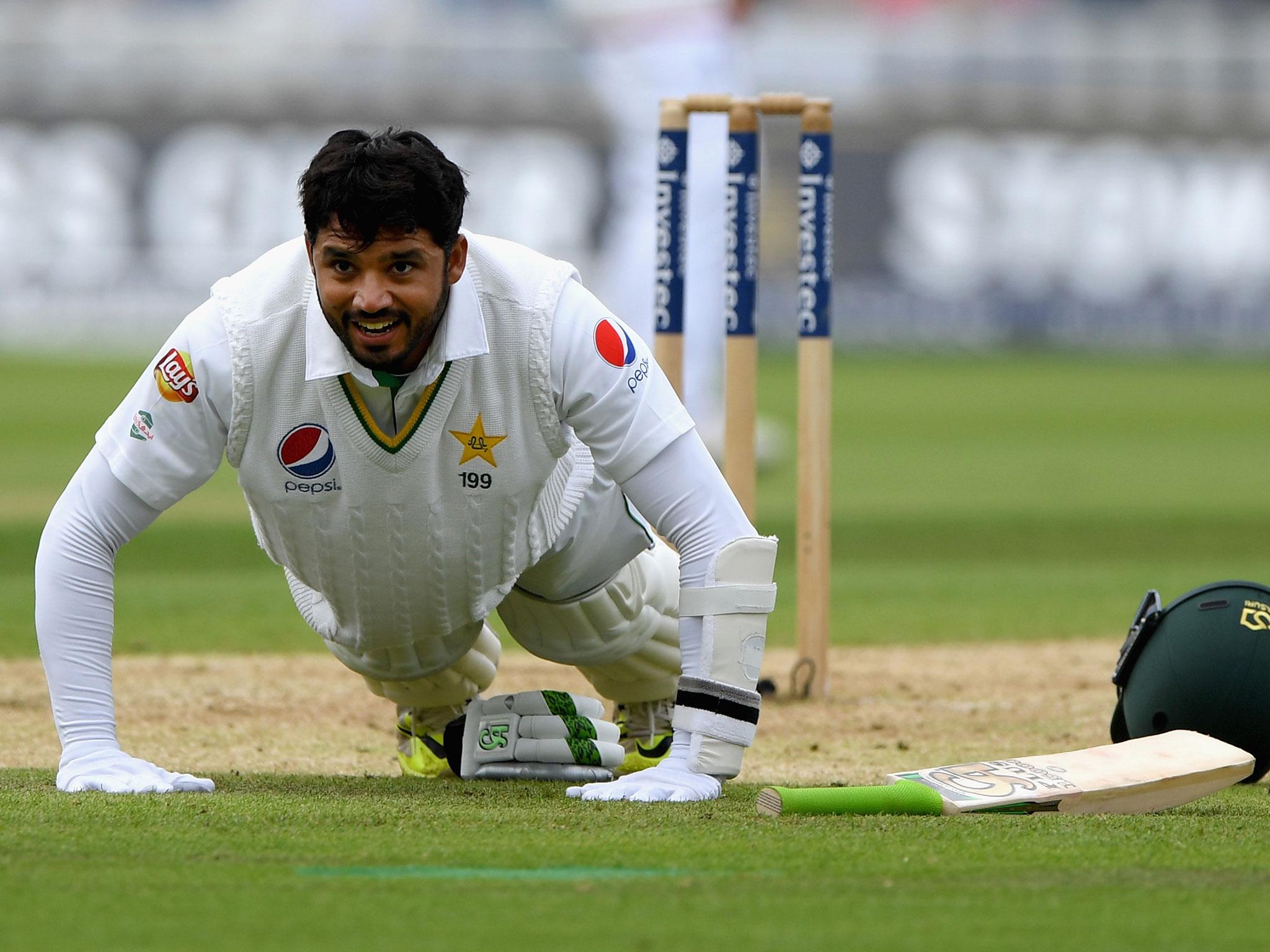 Pakistan’s Azhar Ali celebrates his century with press ups during day two of the third Test at Edgbaston