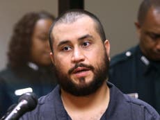 George Zimmerman punched for 'bragging' about killing Trayvon Martin