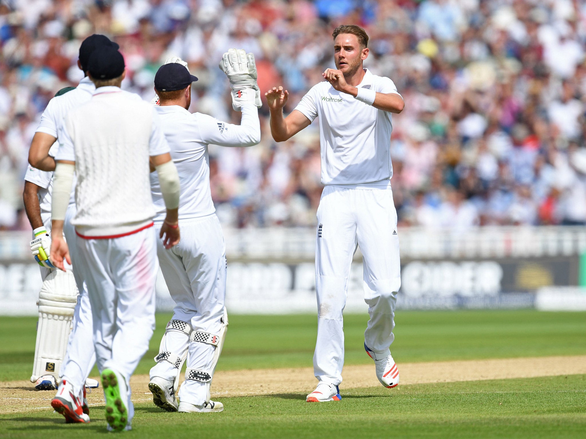 Stuart Broad celebrates taking the wicket of Asad Shafiq
