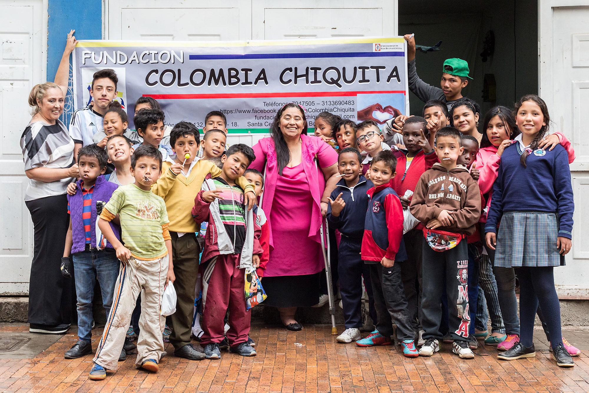 Mama Esperanza pictured (centre) with some of the children supported through Fundacion Colombia Chiquita