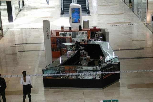 The security cordon in Westfield London shopping centre after a man was stabbed on 5 August