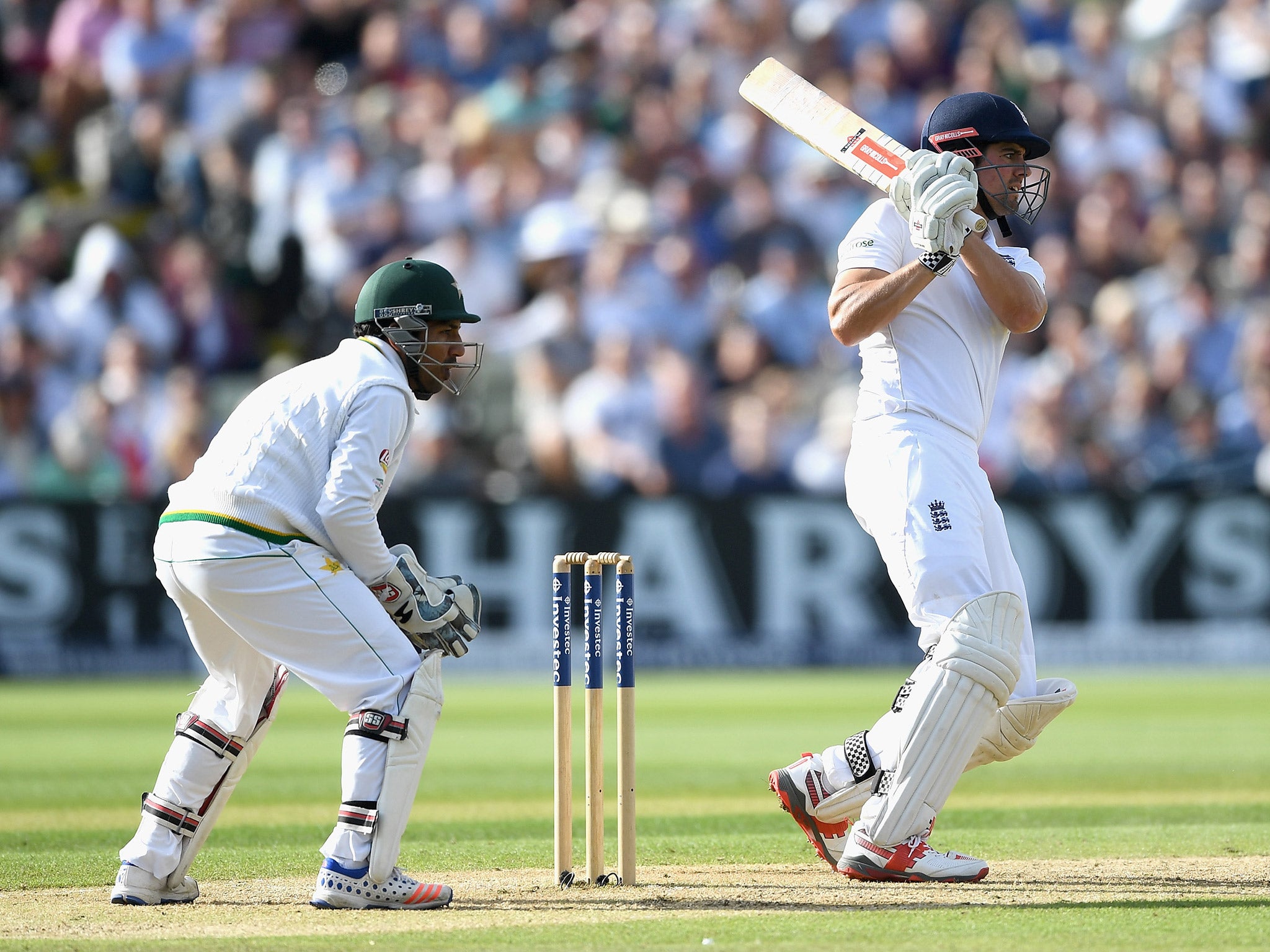 Alastair Cook finished the day unbeaten on 64 as England fought back