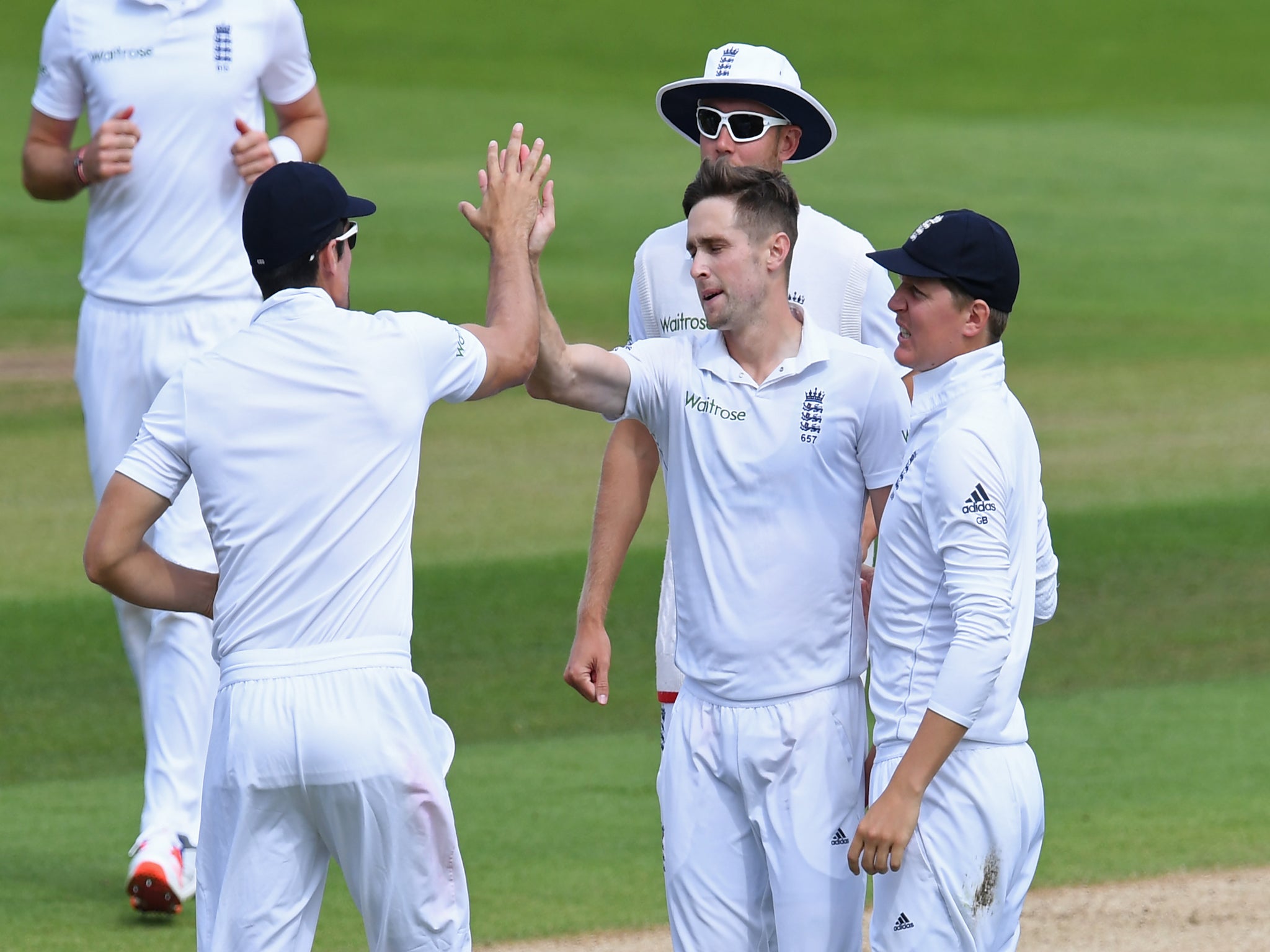 Chris Woakes celebrates after taking the wicket of Pakistan's Younis Khan
