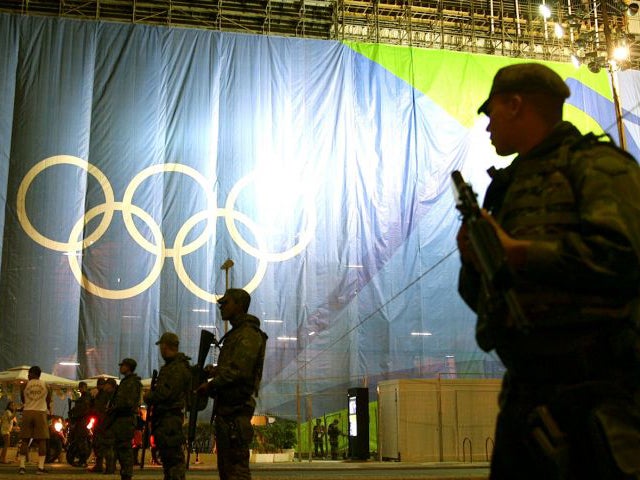 Bomb disposal squad cordon off an area outside the Beach Volleyball Arena at Copacabana beach, Brazil