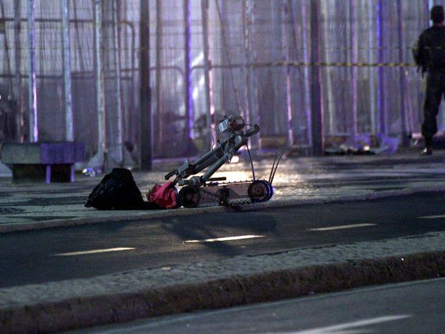 A Bomb disposal robot outside the Beach Volleyball Arena at Copacabana beach, Brazil