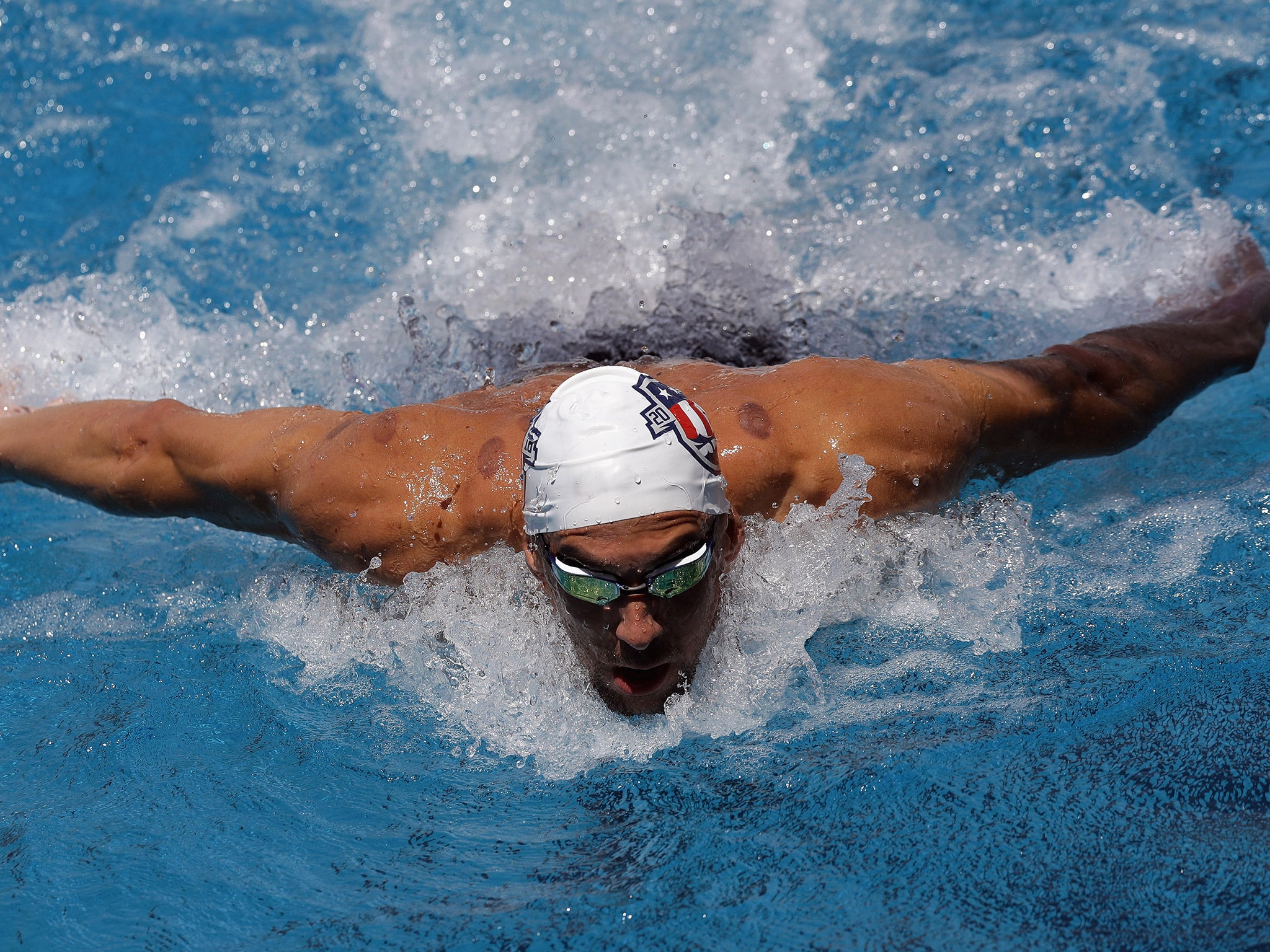 Swimming hero Michael Phelps takes to the pool on Monday