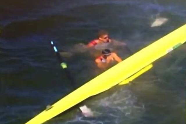 Milos Vasic and Nenad Bedik capsize during the men's pairs