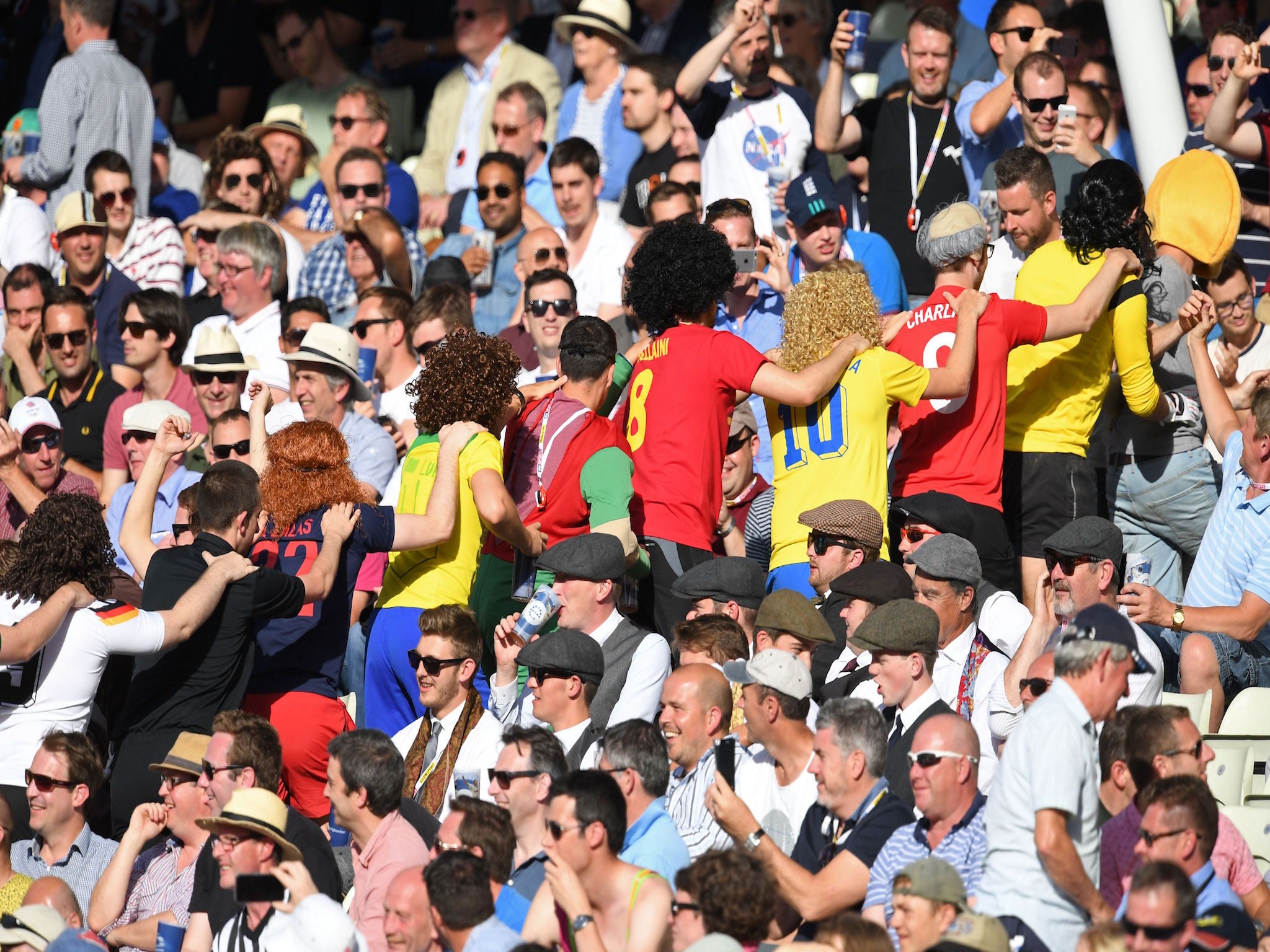 England supporters enjoy the sunshine in the stands