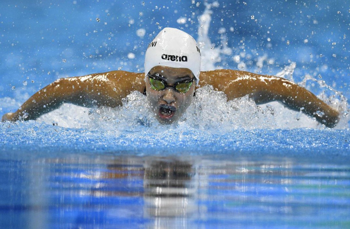 Yusra Mardini competes in the women's 100m Butterfly heat