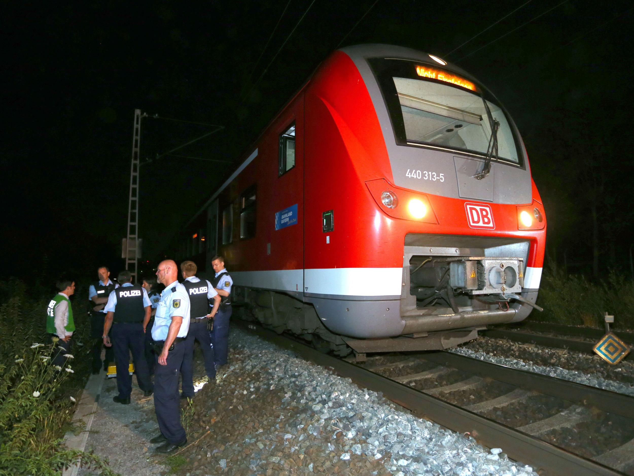 German police killed a teenage assailant after he attacked passengers on a train in Wuerzburg, southern Germany with an axe and a knife on 18 July, seriously wounding three people